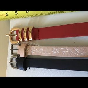 Three ladies belts